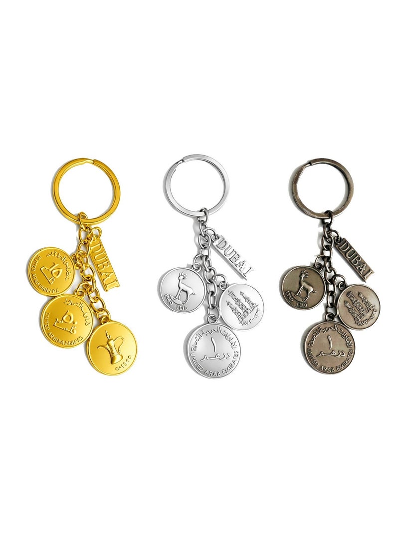 Souvenir Souq Premium UAE Coin Replica Metal Keychain set (3 pcs) featuring iconic UAE currency designs. A perfect Dubai/UAE souvenir, travel gift, and everyday accessory. - Image 1