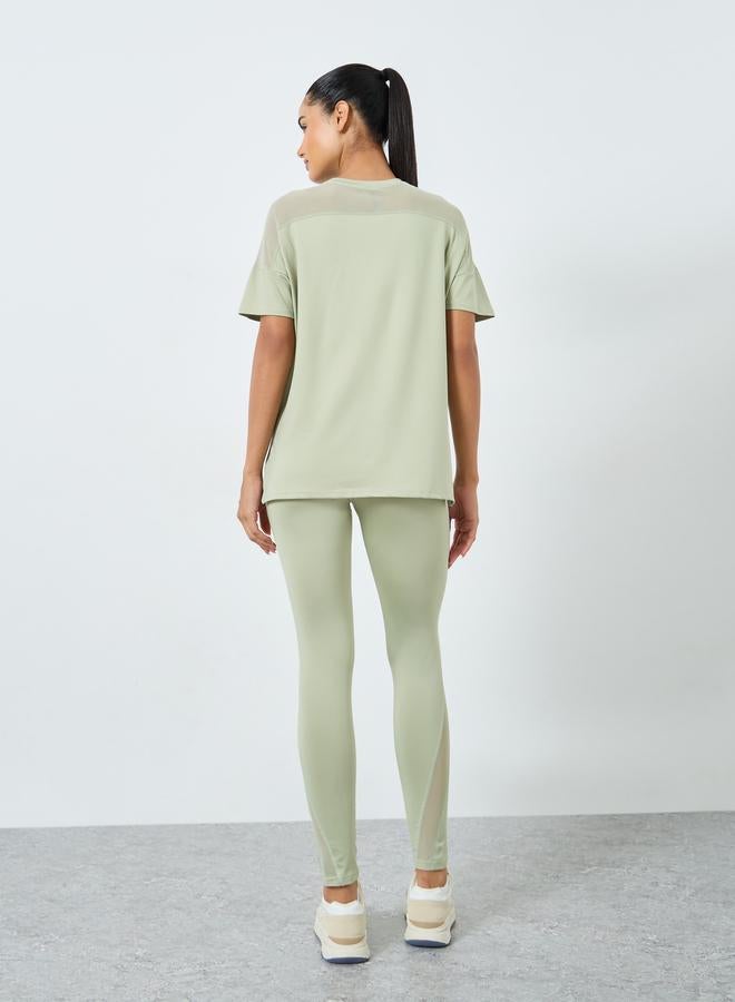 ستايلي اكتيف مجموعة من 3 - بلوزة شبكية وحمالة صدر رياضية مزدوجة مع ليقنز - Image 2