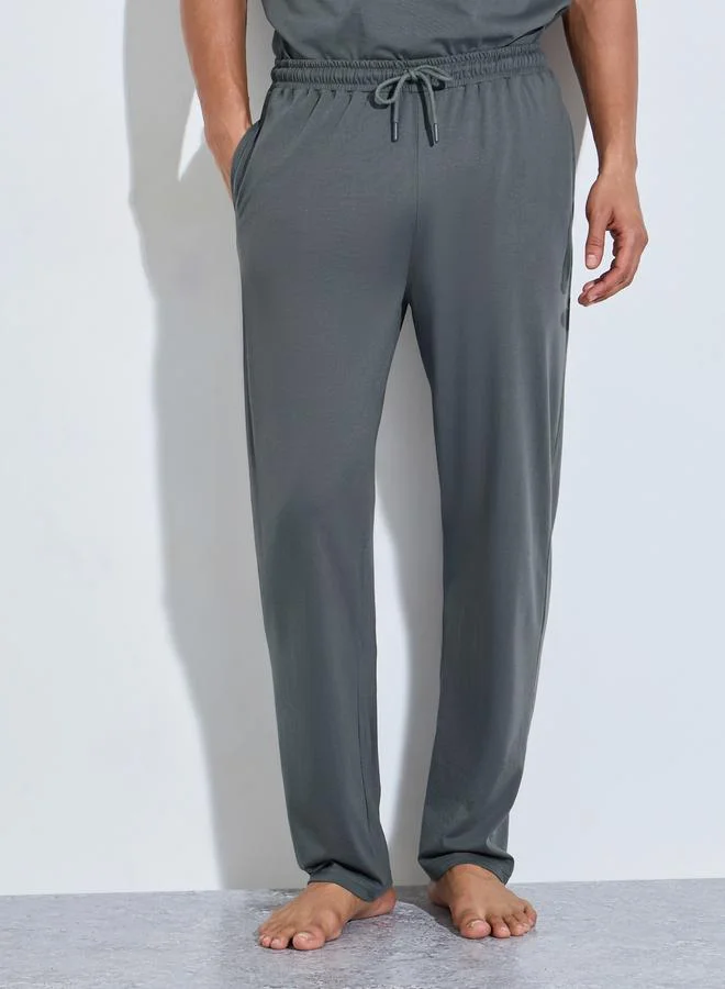 Styli  Men Grey Slogan Print Top and Solid Pants Pyjama Set for Men | Best Price UAE