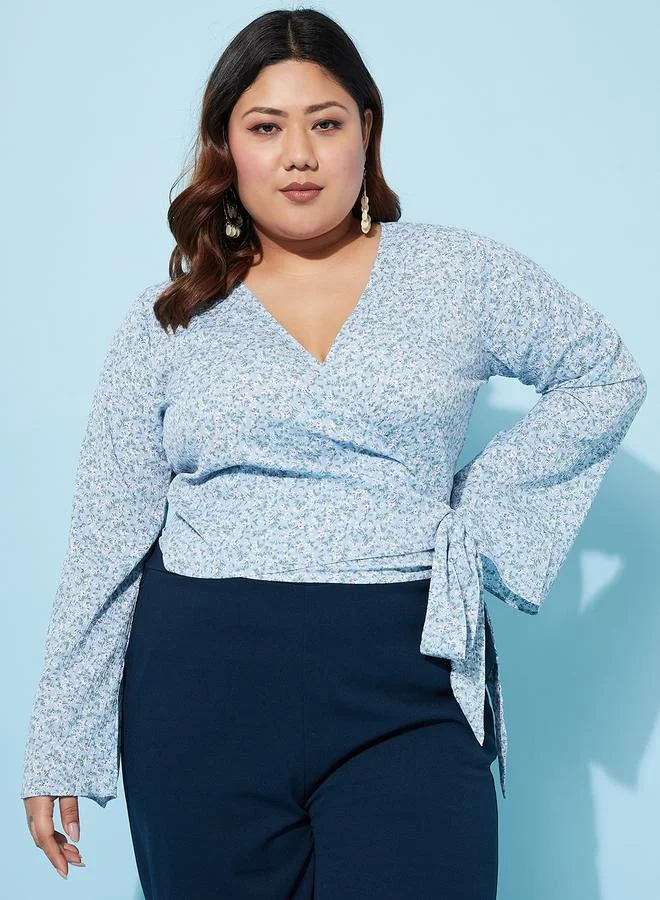 أثينا Plus Size Floral Print Wrap Top with Bell Sleeves by Styli