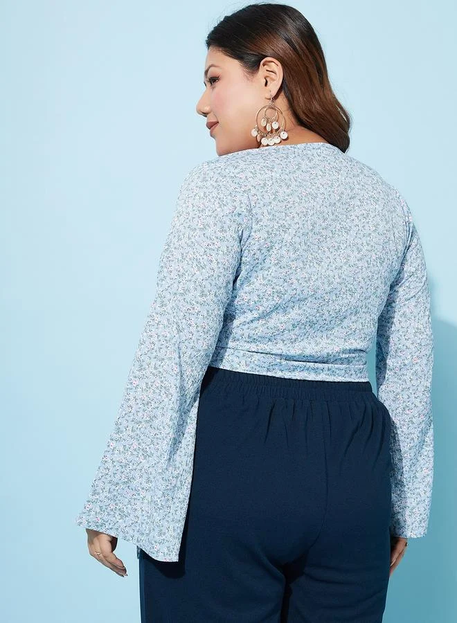 أثينا Plus Size Floral Print Wrap Top with Bell Sleeves by Styli