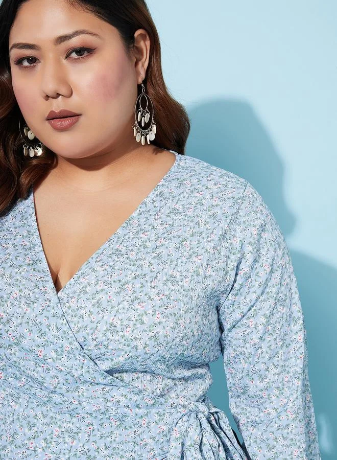 أثينا Plus Size Floral Print Wrap Top with Bell Sleeves by Styli