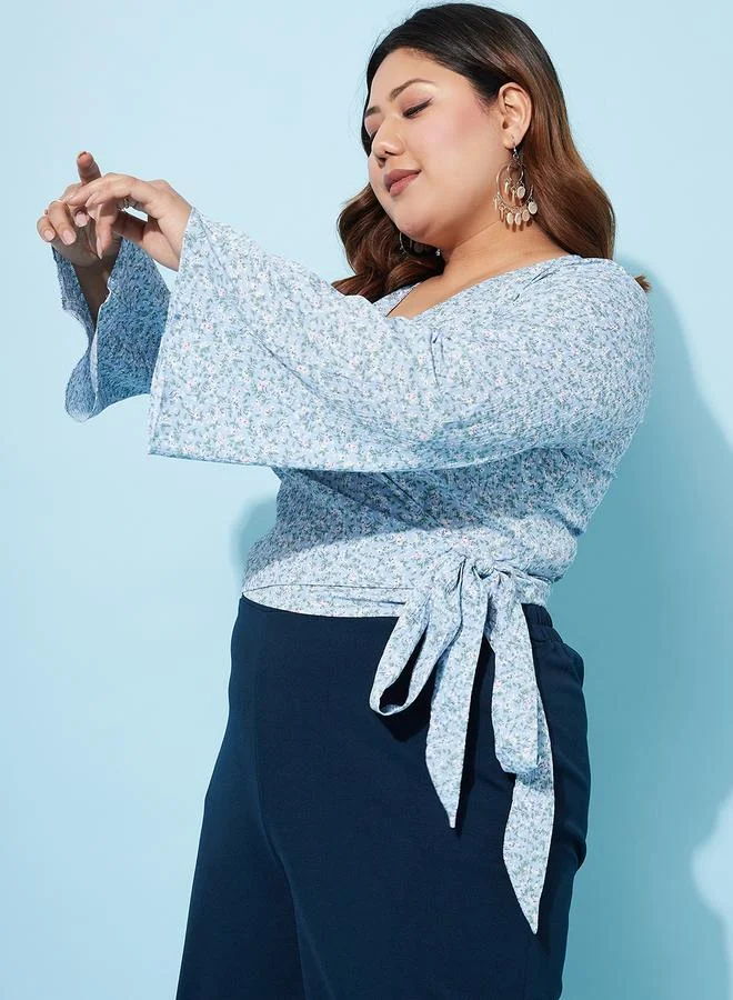 أثينا Plus Size Floral Print Wrap Top with Bell Sleeves by Styli
