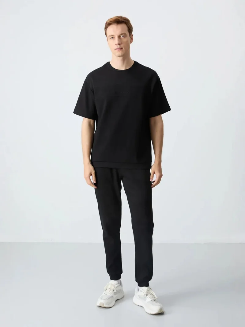 تومي لايف TOMMY Men's Oversized T-shirt And Pants Set