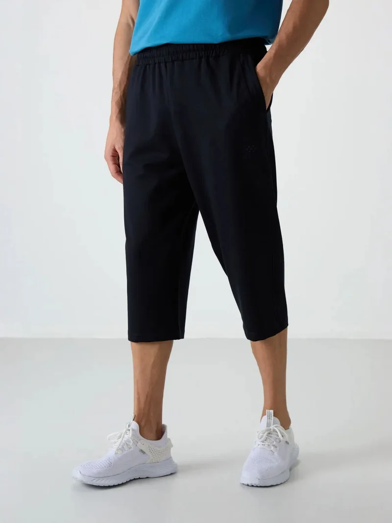 تومي لايف TOMMY Men's Mid-waist Wide-leg Capri Shorts
