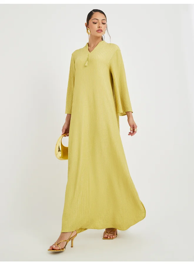 أميرة Amirah Textured Jalabiya with Tassel Detail