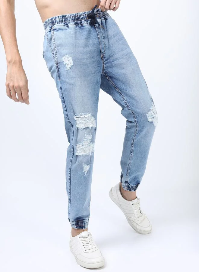 Ketch Light Fade Distressed Jeans with Drawstring Closure by Styli