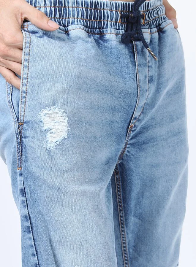 Ketch Light Fade Distressed Jeans with Drawstring Closure by Styli