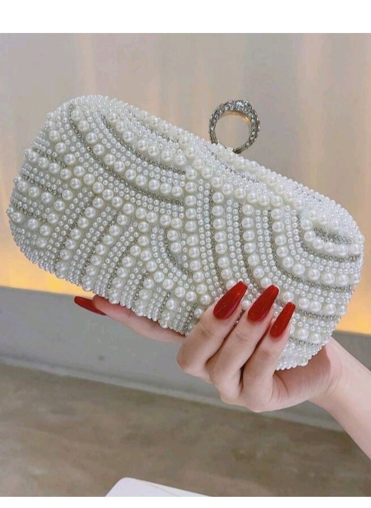 Pearl Luxury Clutch - pzsku/ZA57CB863104FFB298707Z/45/_/1729592387/07511968-ef71-490f-8a80-c439a416f70f