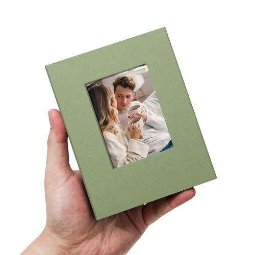Remowith Small 4x6 Photo Album 100 Pockets Linen Cover with Front Window Portable Mini Picture Book for Family Travel Wedding and Memory Keepsake Organizer Light Green - Image 1