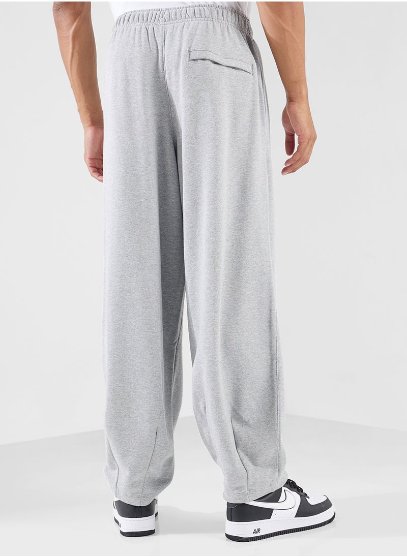 Nike - Club Fitted Oversized Sweatpants - Image 1