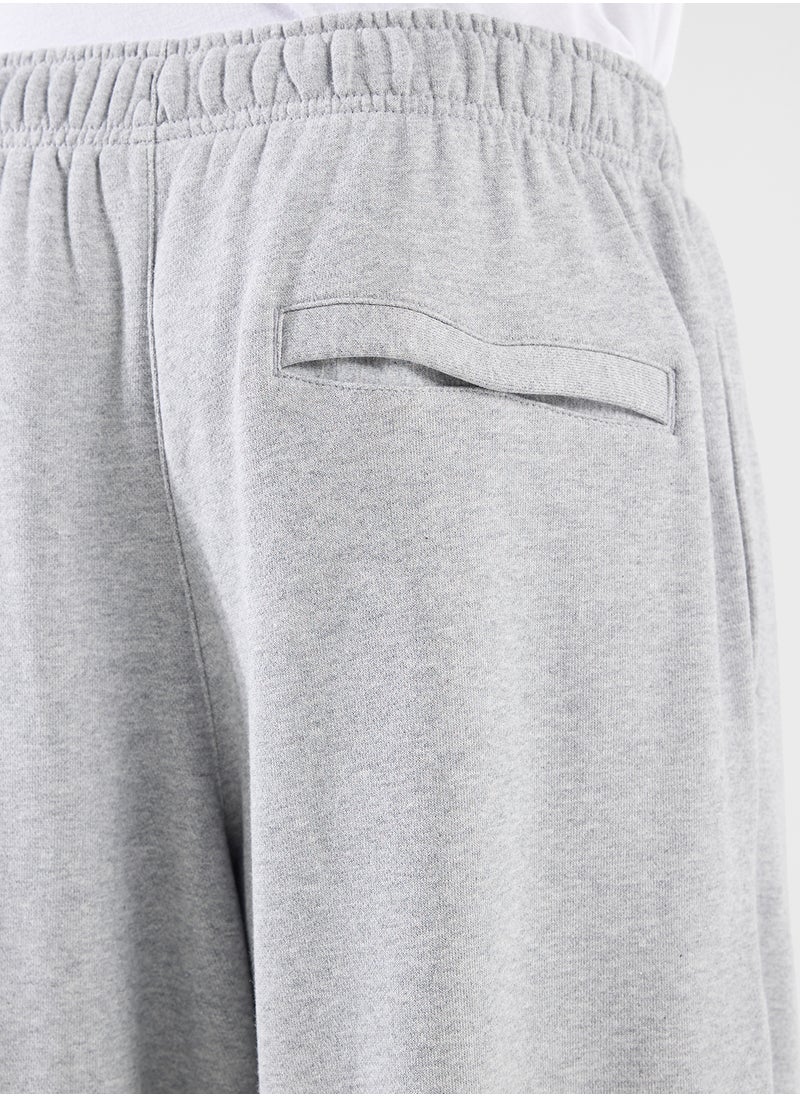 Nike - Club Fitted Oversized Sweatpants - Image 1