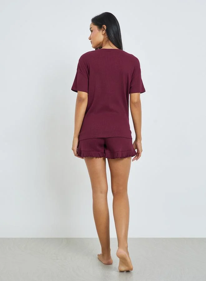Styli  Burgundy Rib Drop Shoulder Cotton T-Shirt and Ruffle Edge Short Set for Women | Best Price UAE