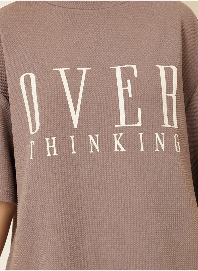 Styli Oversized Textured Contrast Slogan Print Drop Shoulder T-Shirt