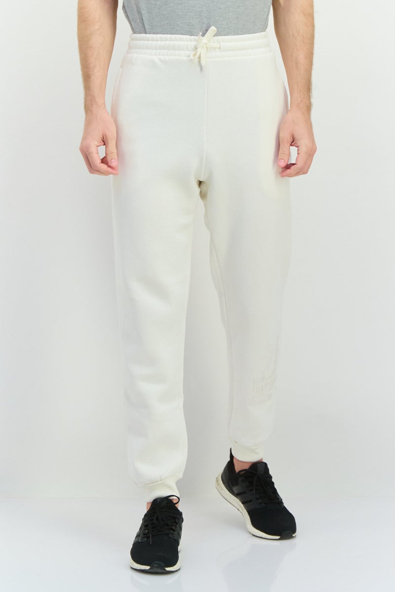 Fudo سروال جوجر للرجال بقصة عادية مع شعار العلامة التجارية، كريمي - Image 1