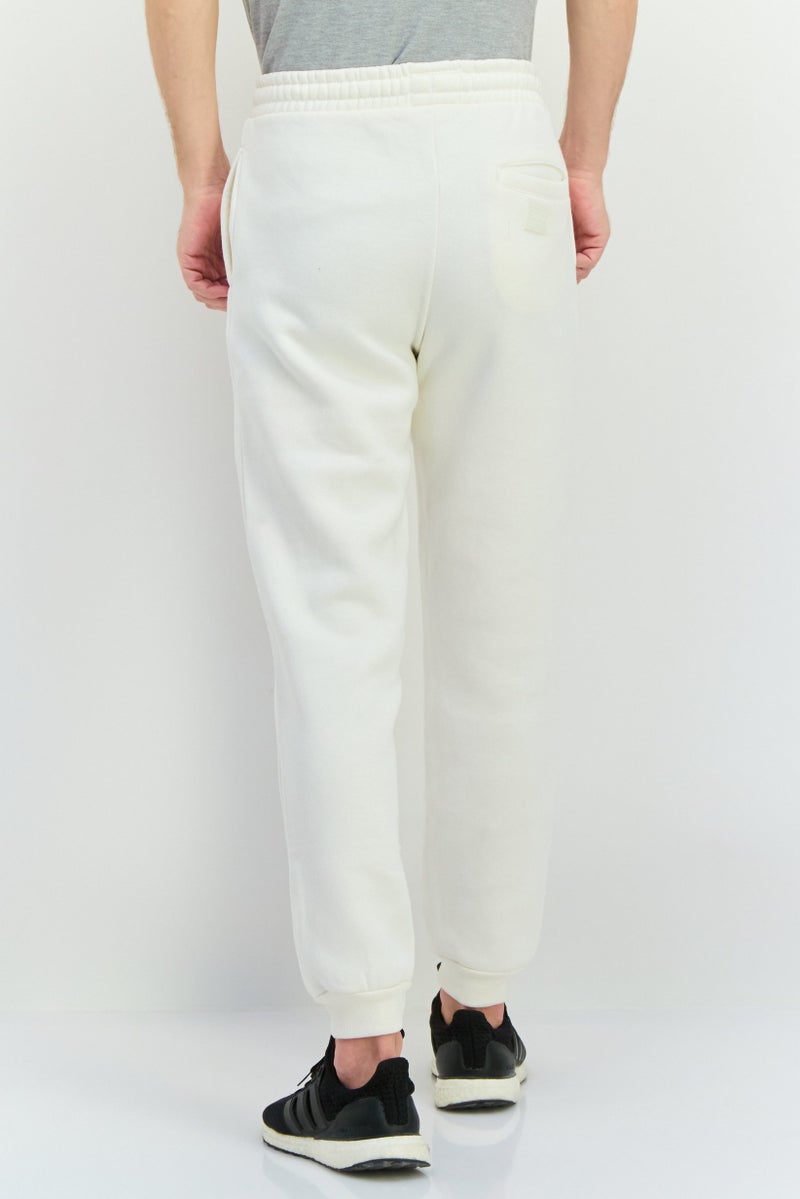 Fudo سروال جوجر للرجال بقصة عادية مع شعار العلامة التجارية، كريمي - Image 2