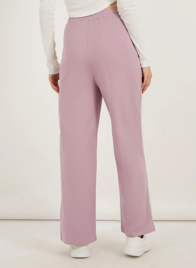 Styli Styli Cross Over Waistband Joggers with Pintuck Detail
