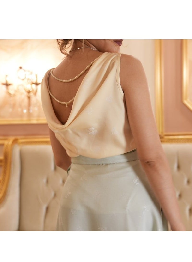 Blouse and wrap skirt with a necklace of Aloo Lo beads in the back, available in different sizes - Image 2