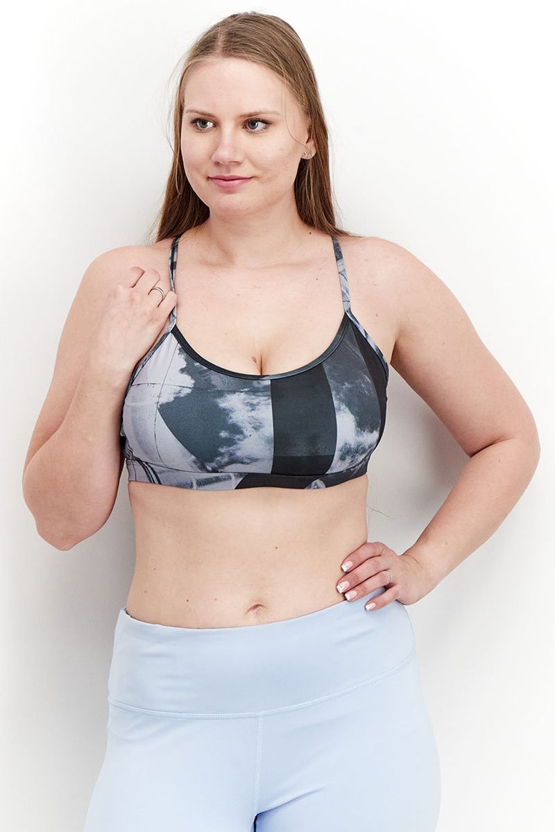 Reebok حمالة صدر رياضية مبطنة مطبوعة للنساء، متعددة الألوان - Image 1