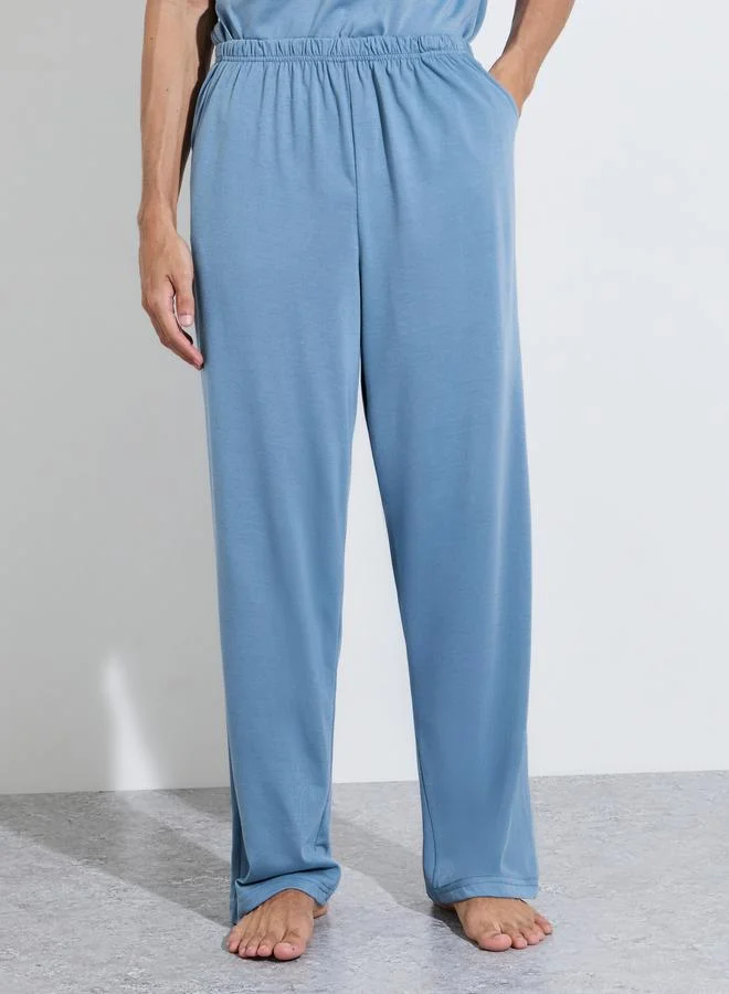 Styli  Blue Slogan Print T-Shirt and Straight Leg Pants Pyjama Set for Men | Best Price UAE