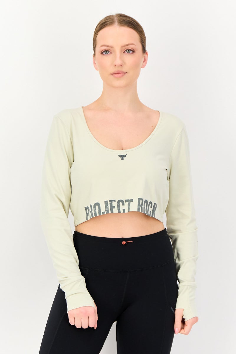 UNDER ARMOUR توب تدريب طويل الأكمام للنساء من أندر أرمور × مشروع روك، كريمي - Image 1