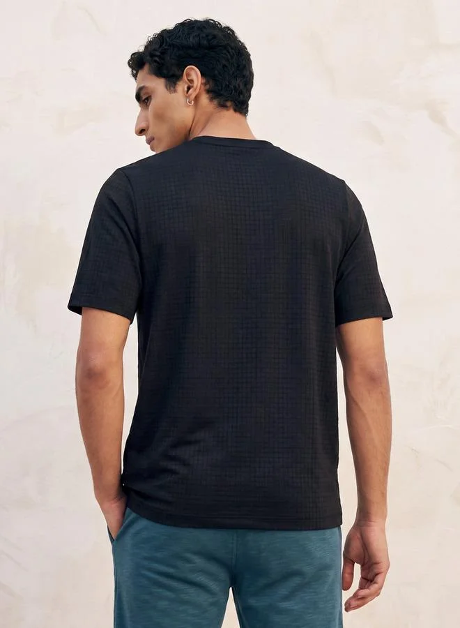 Kappa BLACK Kappa 2 Way Stretch Textured Performance T shirt for Men | Best Price UAE