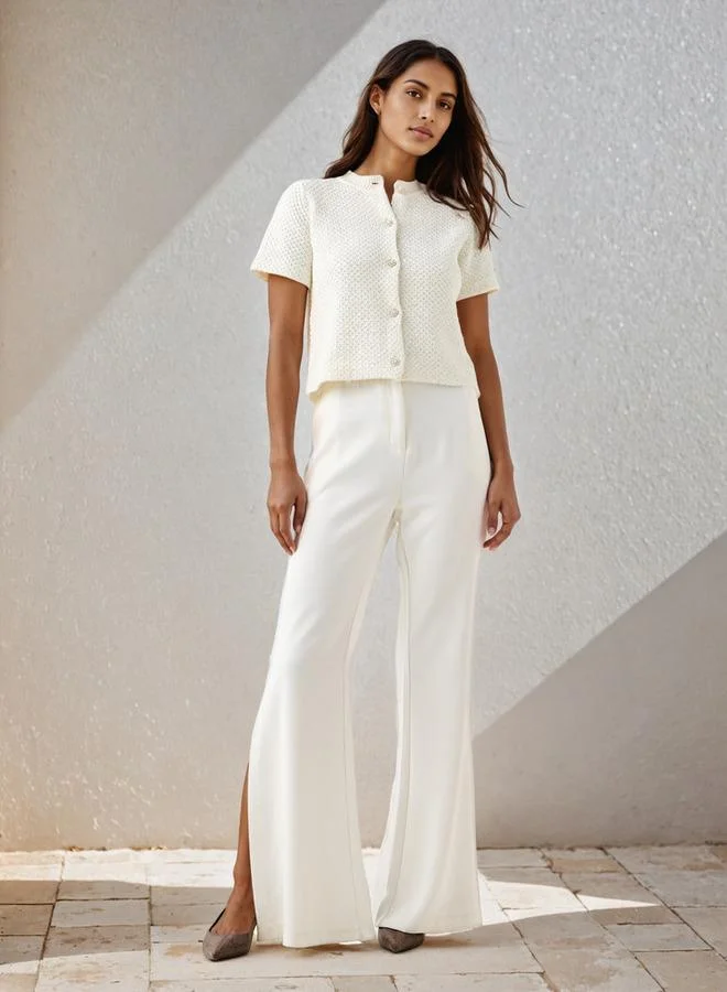 ايكونيك كارديجان بأزرار مزين بأيقونات