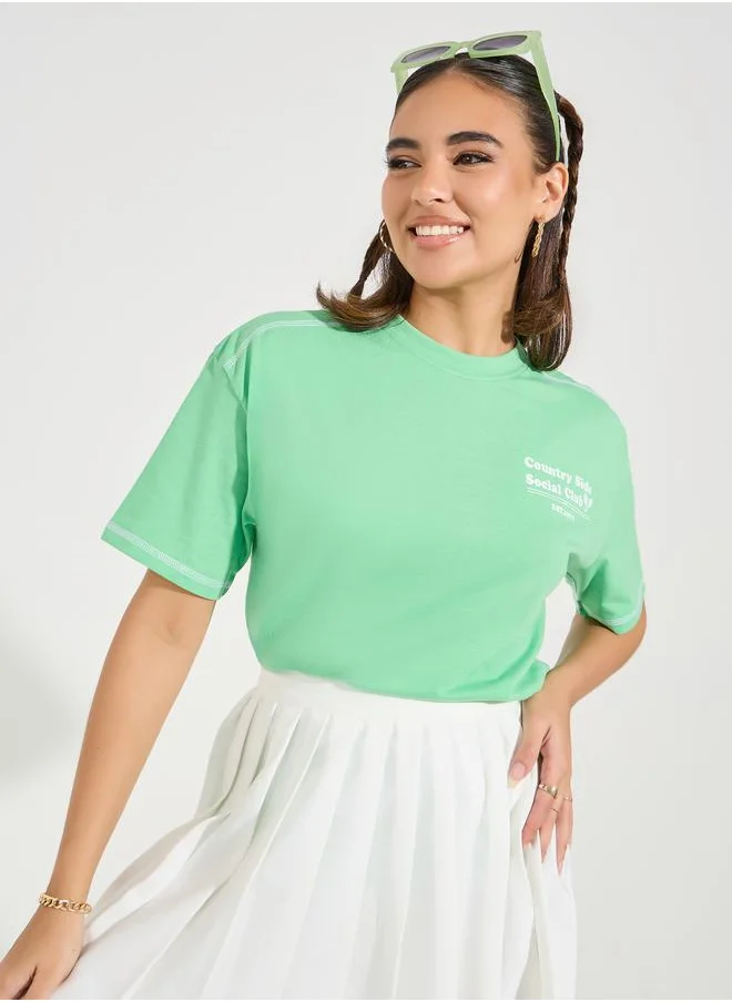 Styli Oversized Slogan Print Contrast Stitch T-Shirt with Dropped Shoulder