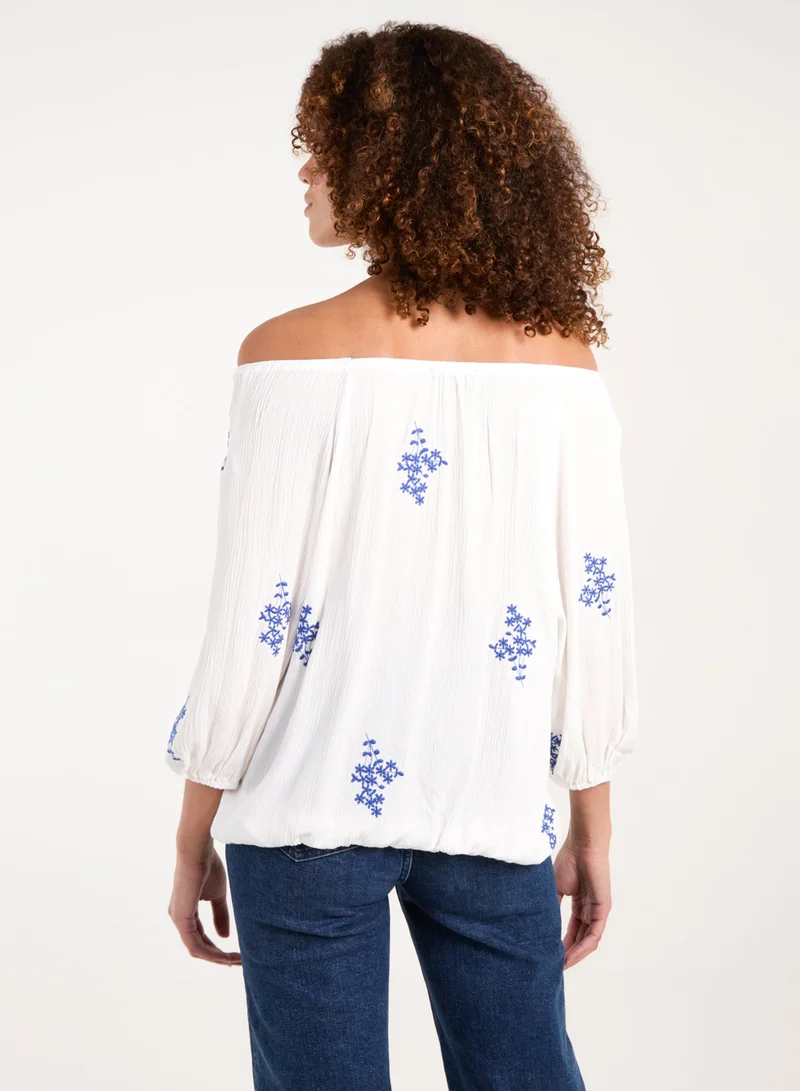 Blue Vanilla Embroidered Puffball Top