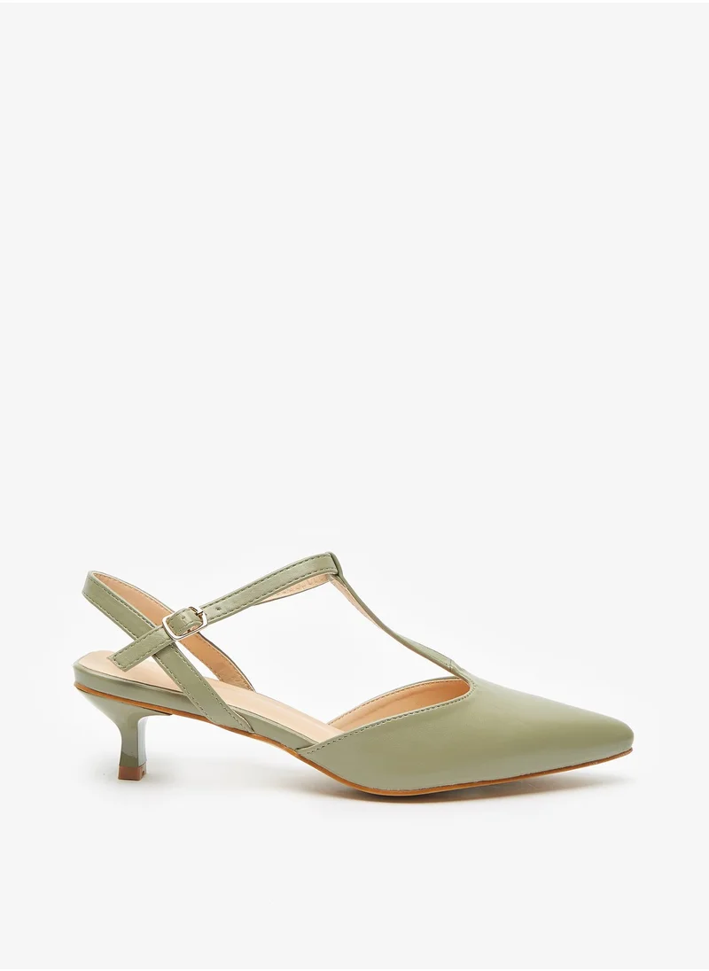 فلورا بيلا من شو إكسبرس Womens Solid Sandals with Kitten Heels and T Strap Buckle Closure