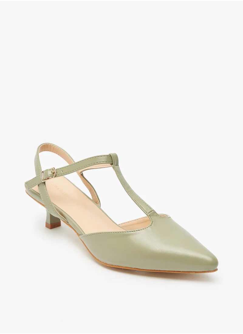 فلورا بيلا من شو إكسبرس Womens Solid Sandals with Kitten Heels and T Strap Buckle Closure