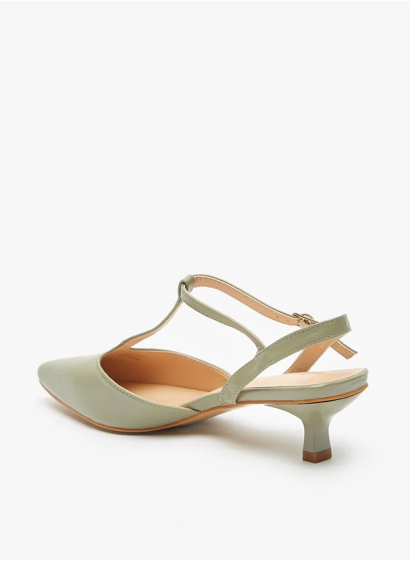فلورا بيلا من شو إكسبرس Womens Solid Sandals with Kitten Heels and T Strap Buckle Closure