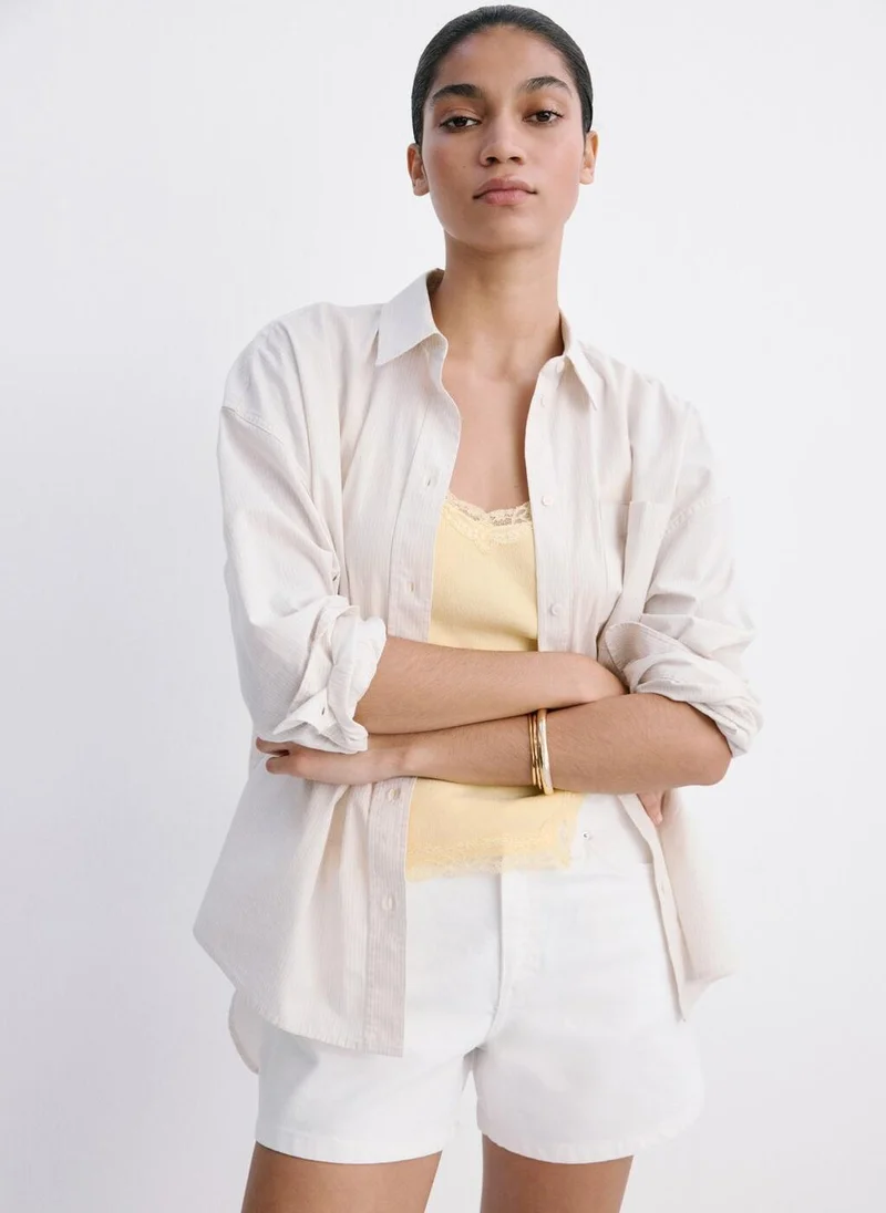 MANGO Denim shorts with frayed hem