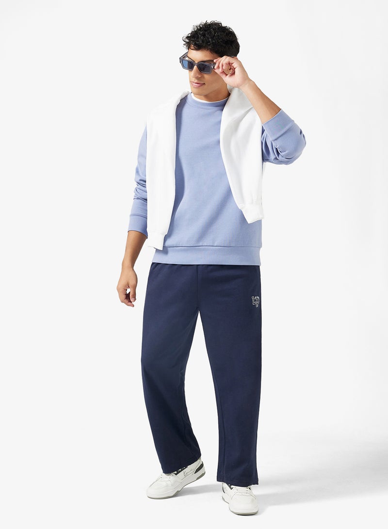 سفنتي فايف بيسيكس بنطلون رياضي بطبعة نصية وحافة مفتوحة - Image 2