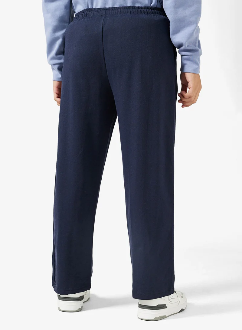 Seventy Five Basics Text Print Open Hem Oversized Joggers