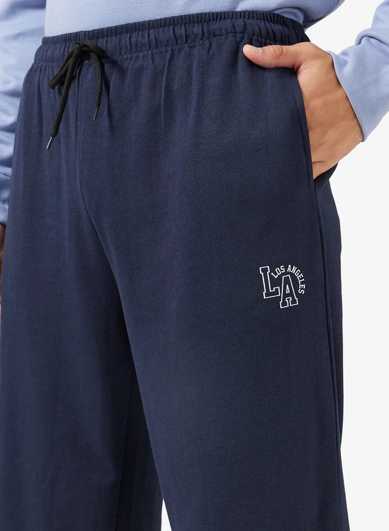 Seventy Five Basics Text Print Open Hem Oversized Joggers