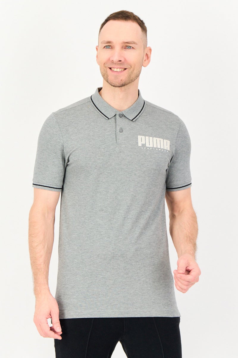PUMA Men Sportswear Fit Short Sleeve Outdoor Polo Shirt, Heather Grey - Image 1