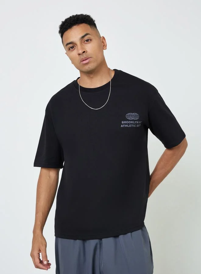 Styli Men Graphic Print Oversized Jersey T-Shirt