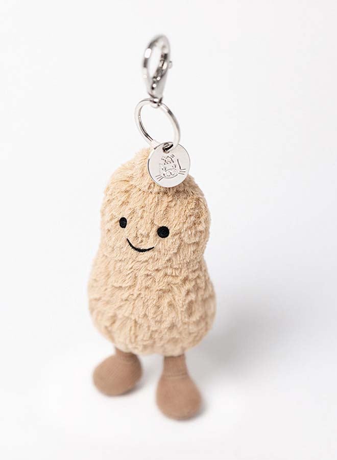 Jellycat سحر حقيبة الفول السوداني من أميزيبلز - سلسلة مفاتيح فول سوداني محشوة لطيفة بوجه مبتسم وقفل معدني - إكسسوار حقيبة ناعم بطول 18 سم للحقائب والمفاتيح والهدايا - Image 2