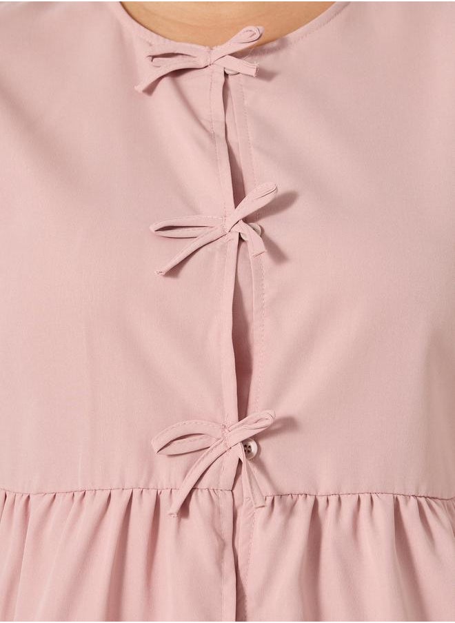 Styli - Plus Size Puff Sleeve Ribbon Tie-Up Top - Image 1
