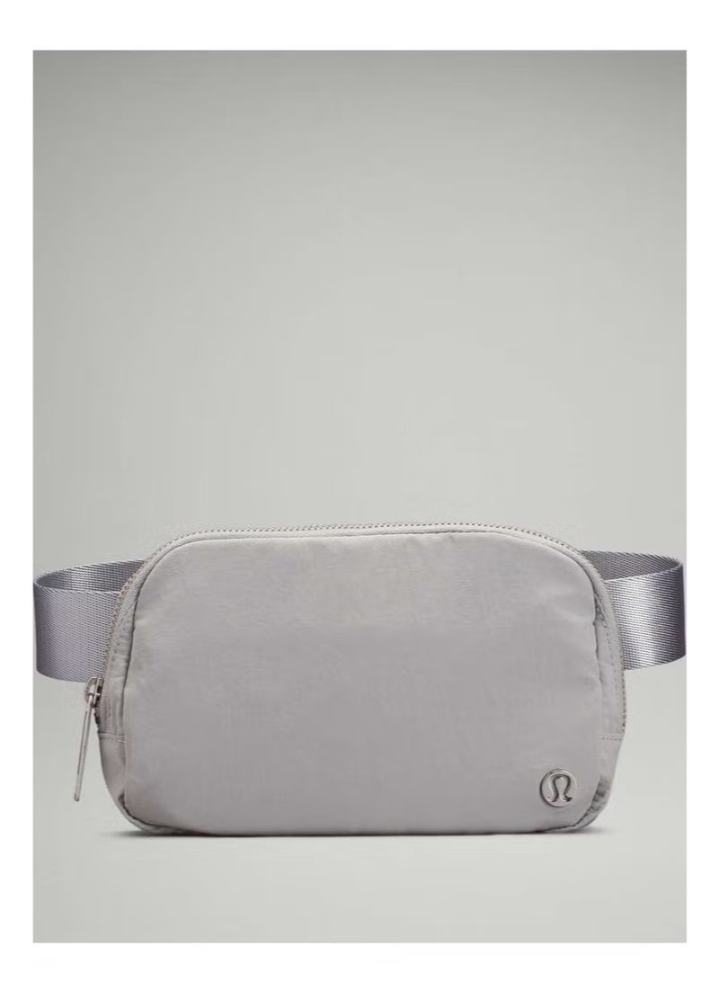 Lululemon Everywhere Belt Bag, Compact, and Convenient Belly Bag with Zippered Pockets, Easy-Access Exterior Pocket, and Interior Essentials Pocket for On-the-Go Storage, Grey - Image 1