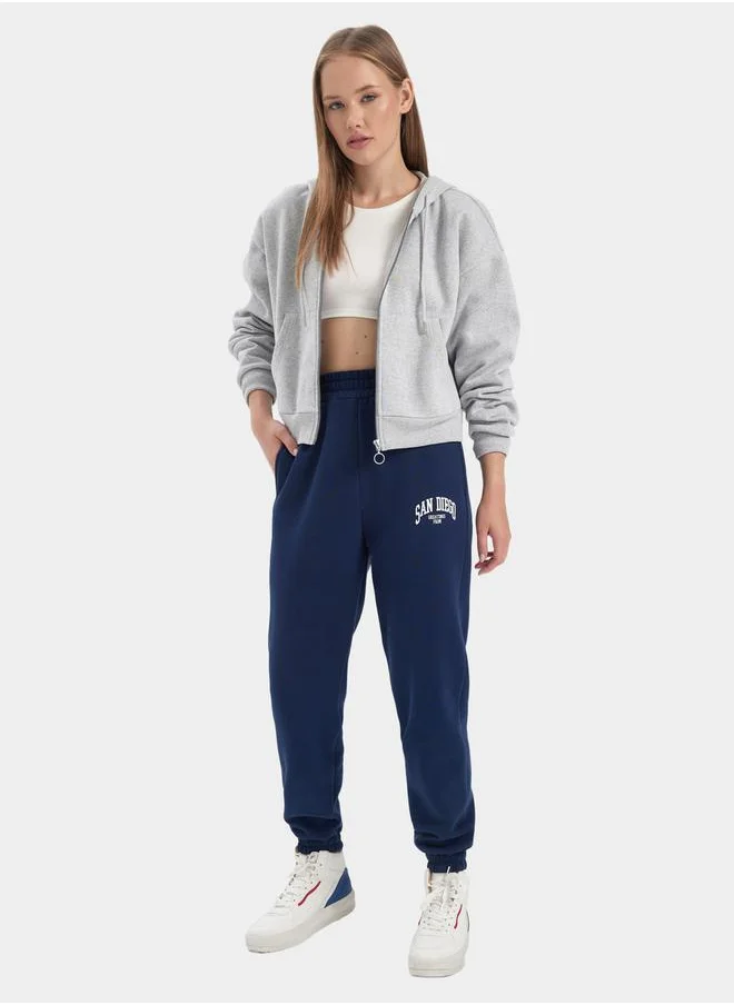 ديفاكتو Slogan Print Elasticated Cuff Joggers with Pockets by Styli