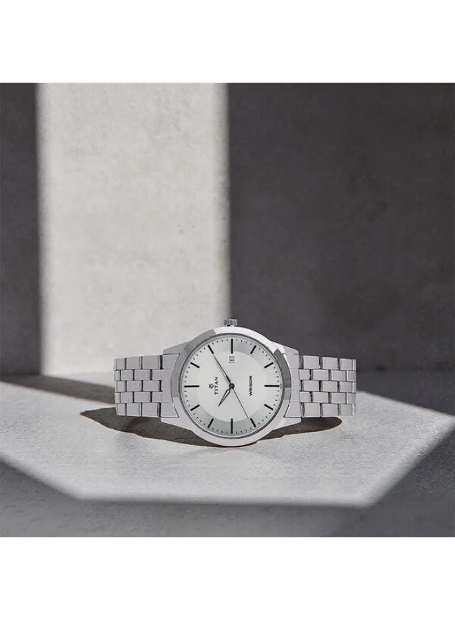 تيتان ساعة يد رجالية من الستانلس ستيل دائرية بعقارب