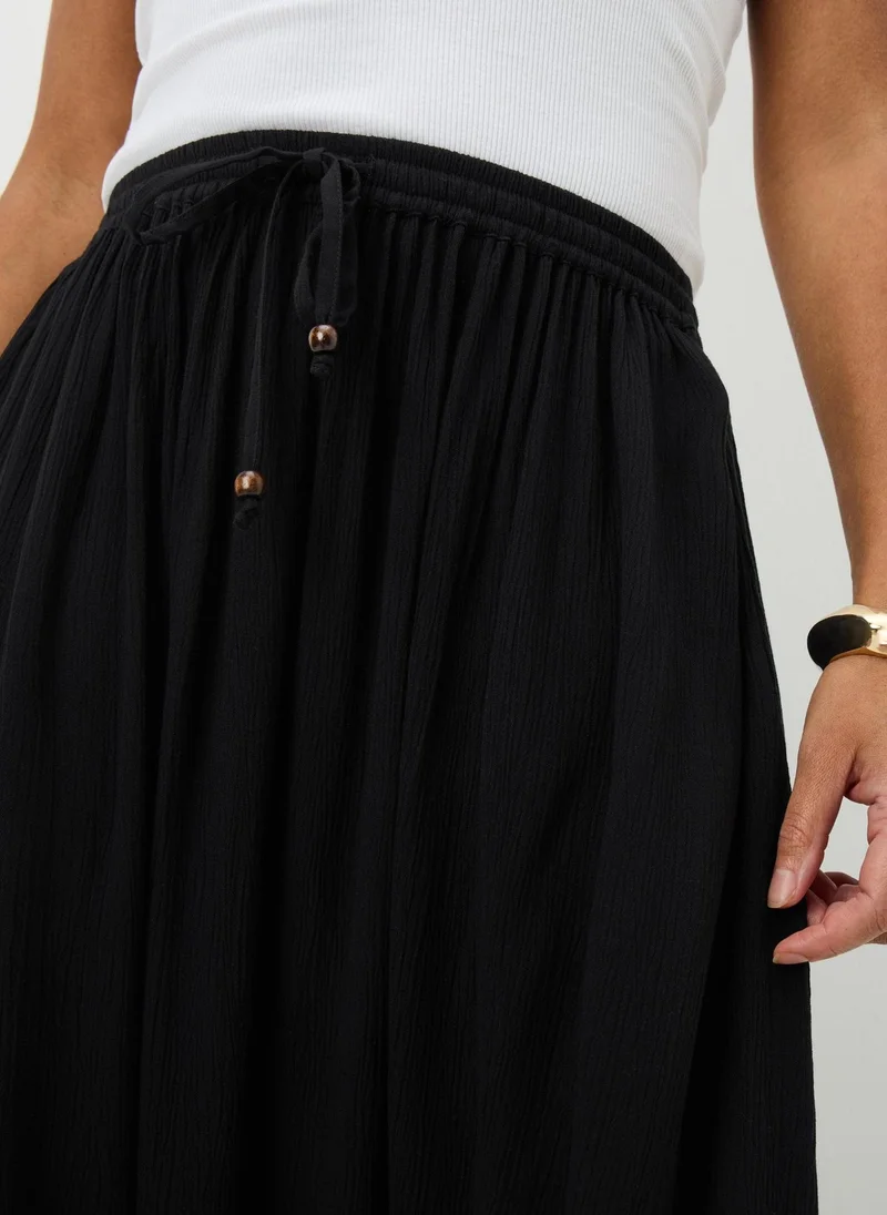 ماتلان Black Cheesecloth Maxi Skirt
