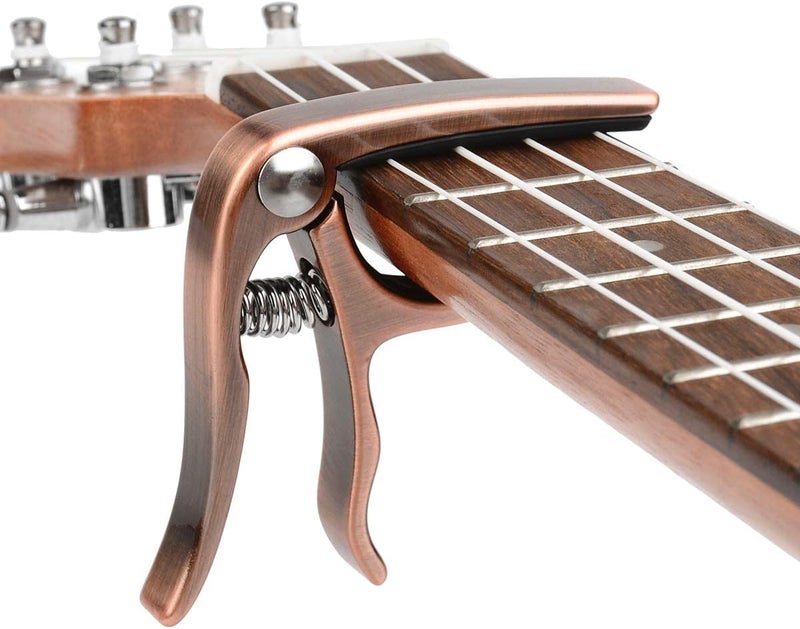 BestSounds UKULELE CAPO - 4 String for Soprano, Concert, Tenor Ukulele Zinc Alloy Professional Capo Heavyweight Feeling with 2pack Ukulele Felt Picks (Bronze) - Image 4