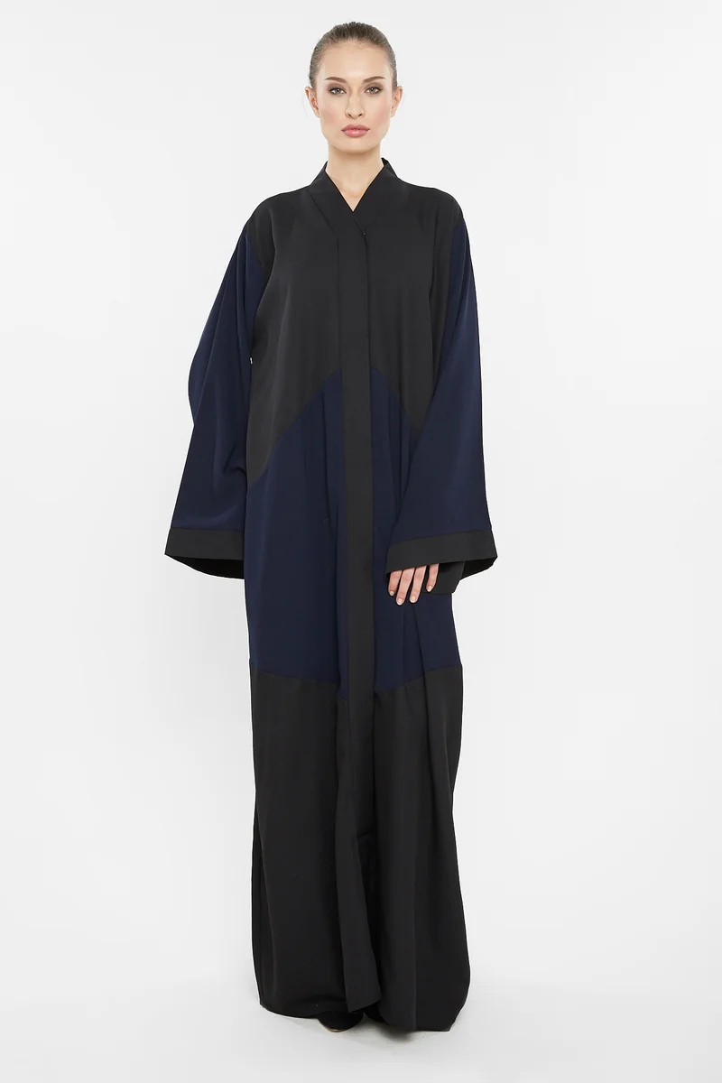 NUKHBAA A casual duo-colored abaya in black and navy blue with cross cut detail-AJ124A