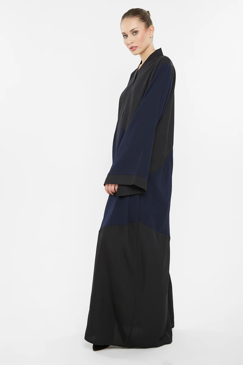 NUKHBAA A casual duo-colored abaya in black and navy blue with cross cut detail-AJ124A
