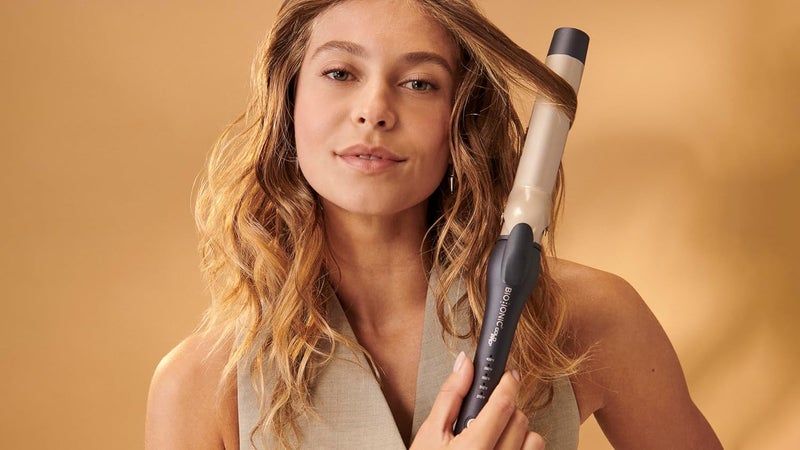 BIO IONIC GoldPro 1" or 1.25” Curling Iron, Blue, Moisturizing Heat & 24K Gold MX, New & Improved 15% Longer Barrel Ceramic Curling Iron, Adjustable Heat, Versatile Curling Wand for Long-Lasting Curls - Image 2