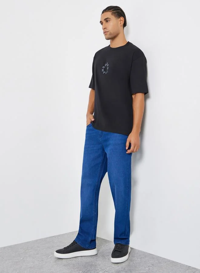 Styli Men Black Slogan Print Oversized T-Shirt