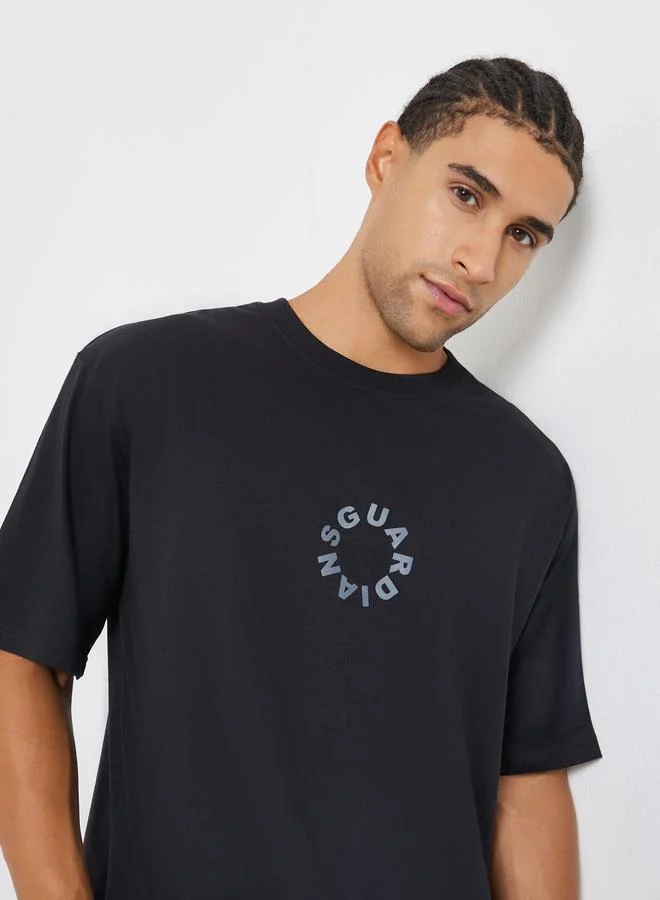 Styli  Men Black Slogan Print Oversized T-Shirt for Men | Best Price UAE